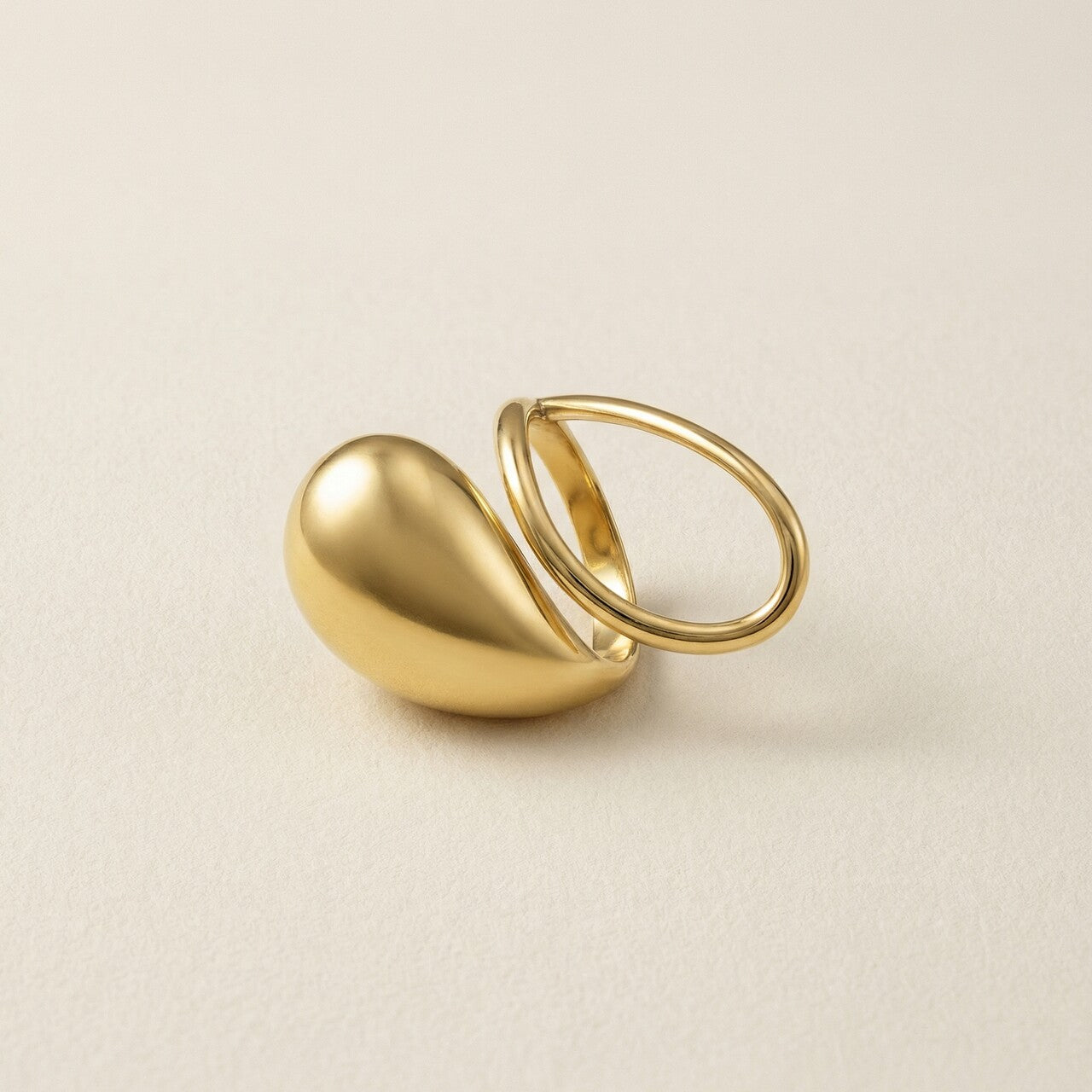 Fluid Form Drop Curve Ring