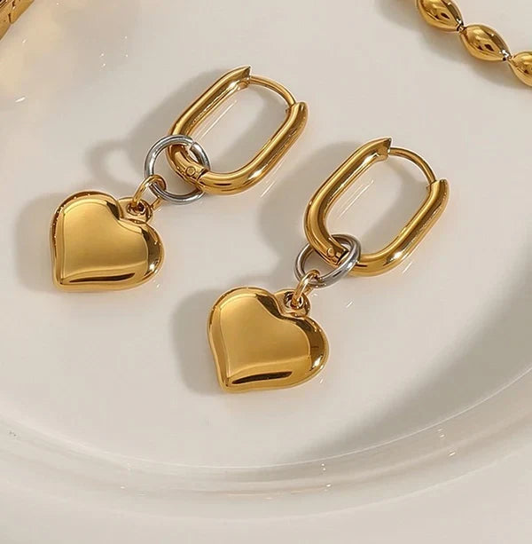 Golden Oval Hoop Earrings with Puffed Heart Charms