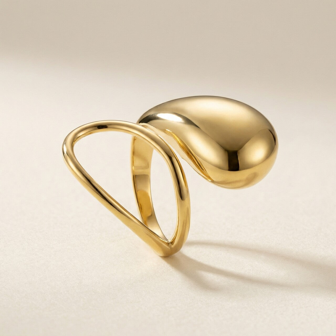 Fluid Form Drop Curve Ring