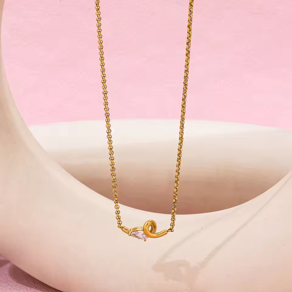 Golden Abstract Ribbon Necklace with Pear-Cut Stone
